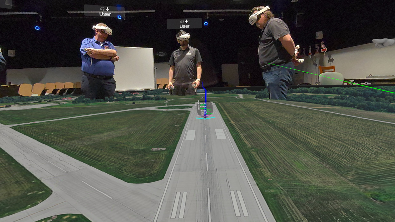 Image of people in headsets viewing a CollabXR virtual scene of plane landing on an airport runway
