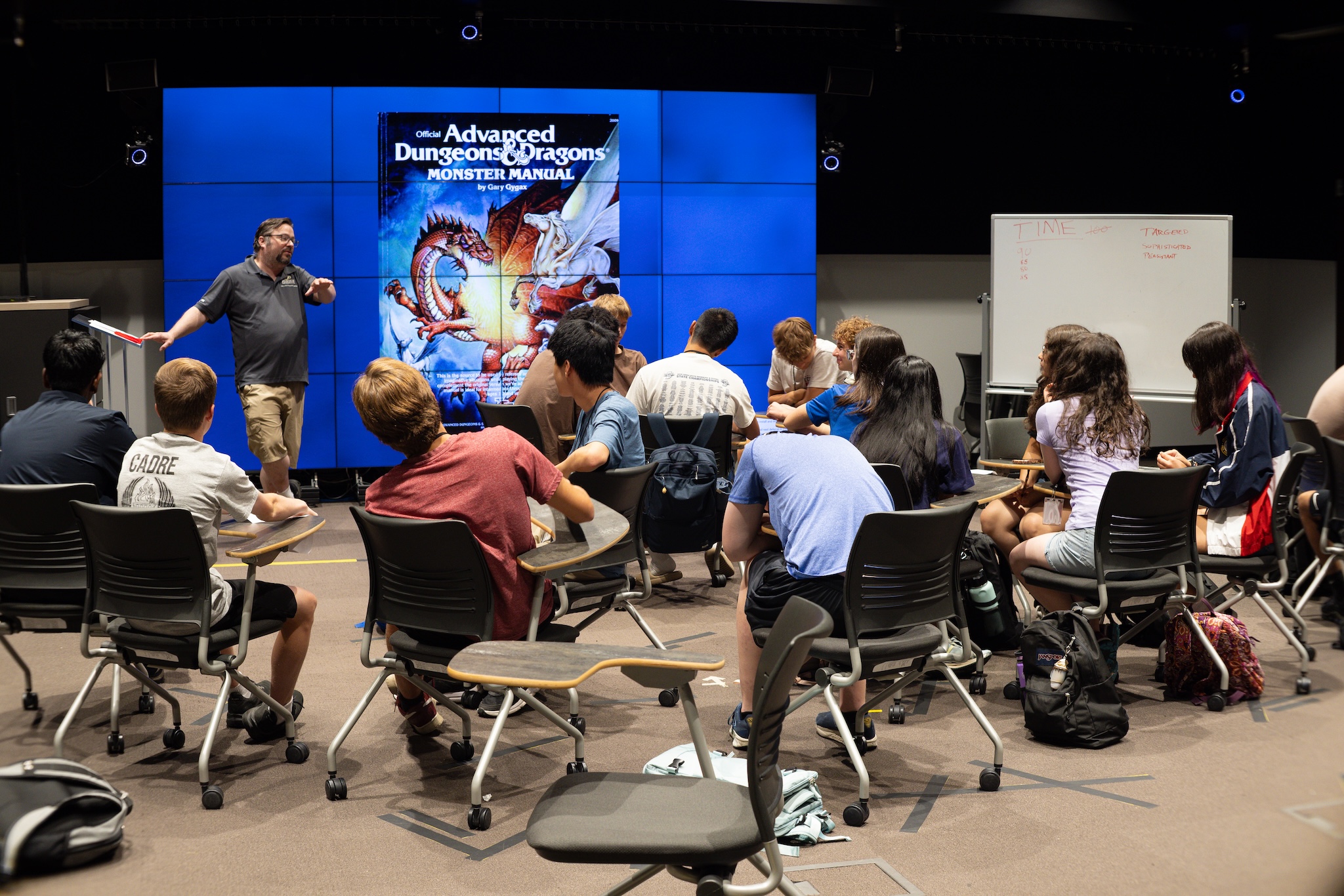 Students participating in RPG-style critical thinking STEM exercise