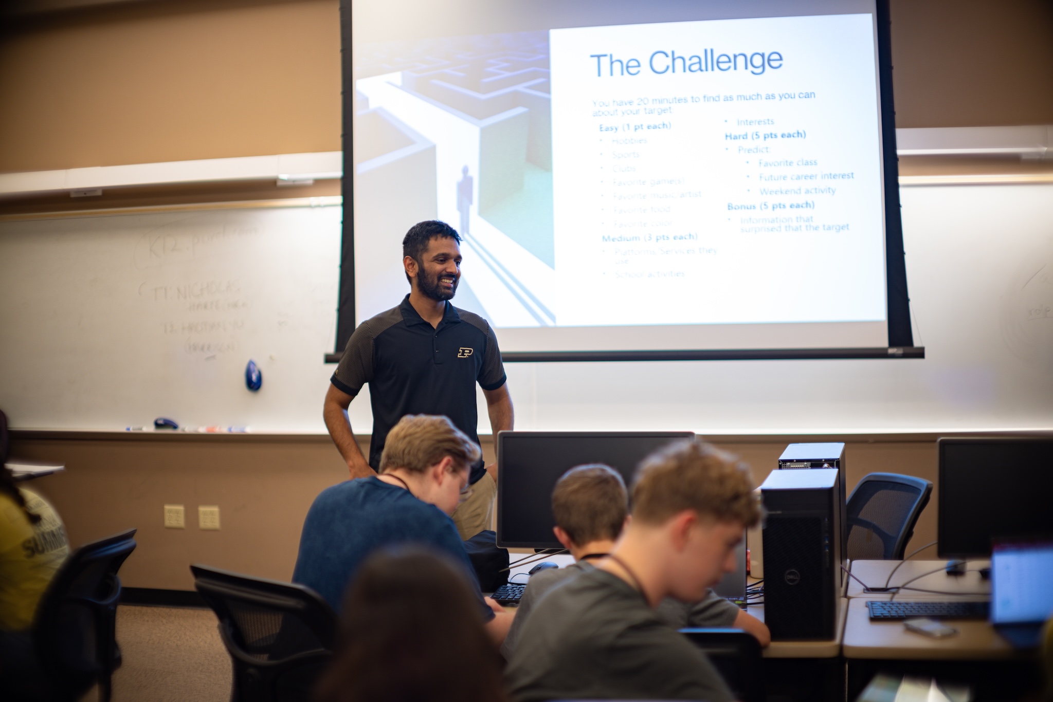Students tackling an OSINT (open-source intelligence) challenge during the CyberSafe Heroes camp