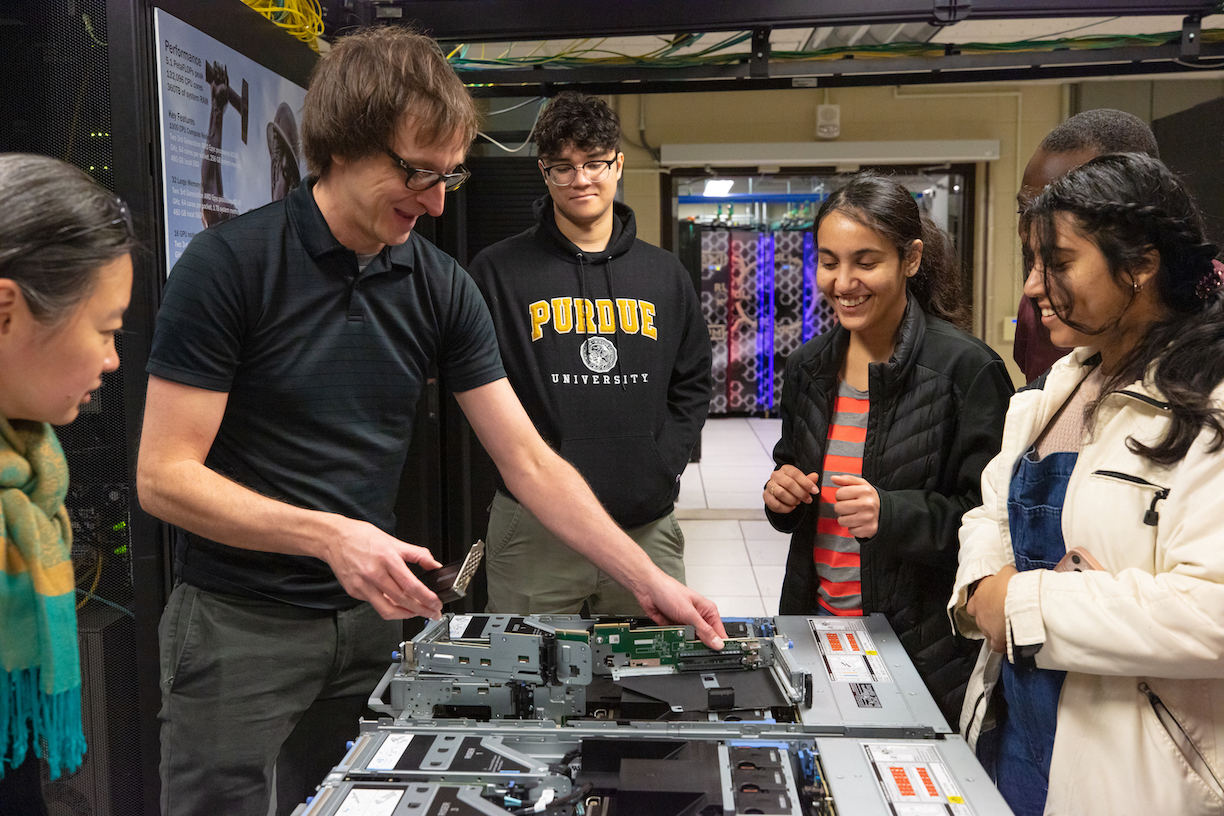 Erik explaining some elements of a cluster node to students