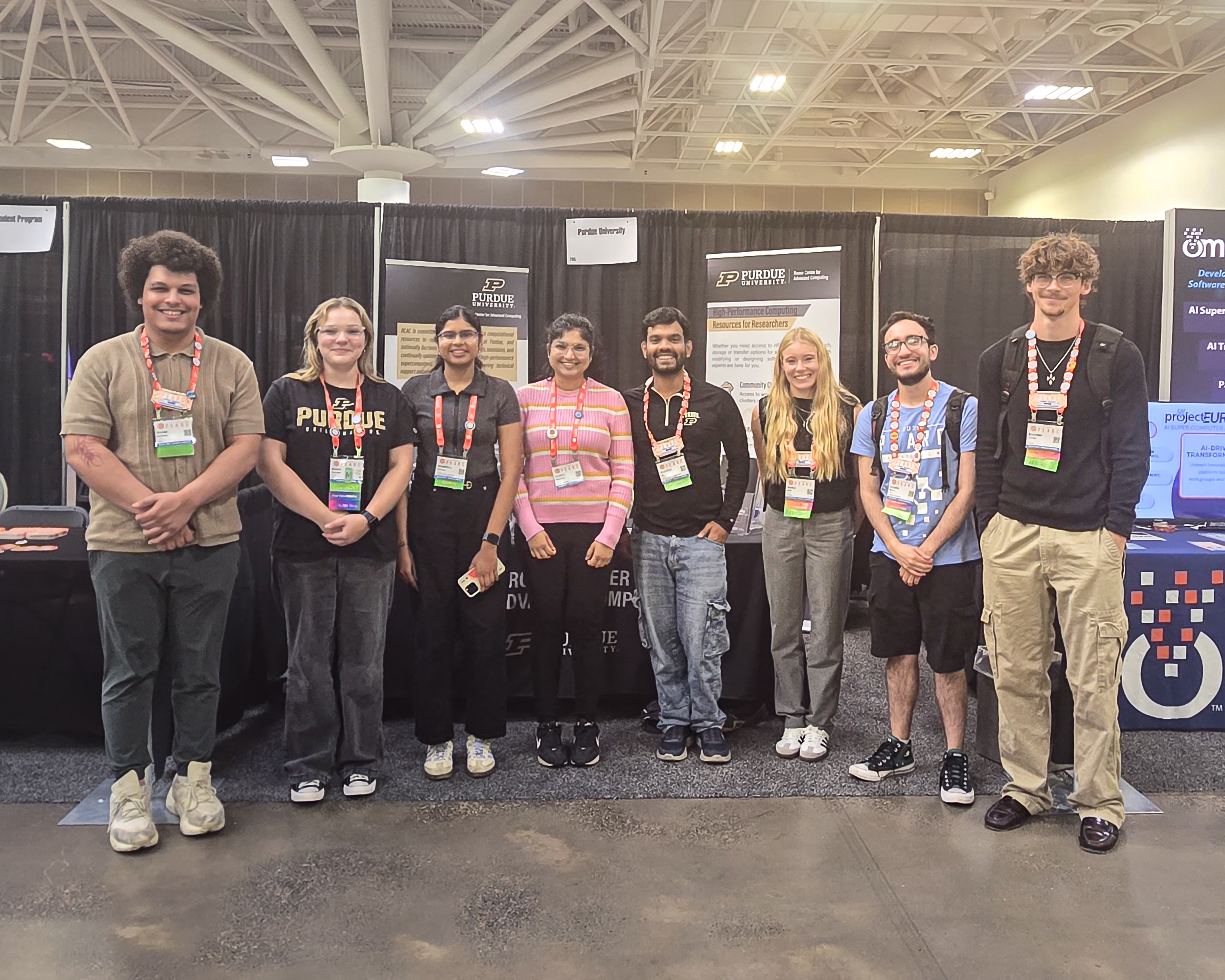 Eight of the CI-XP students in a group photo at PEARC26