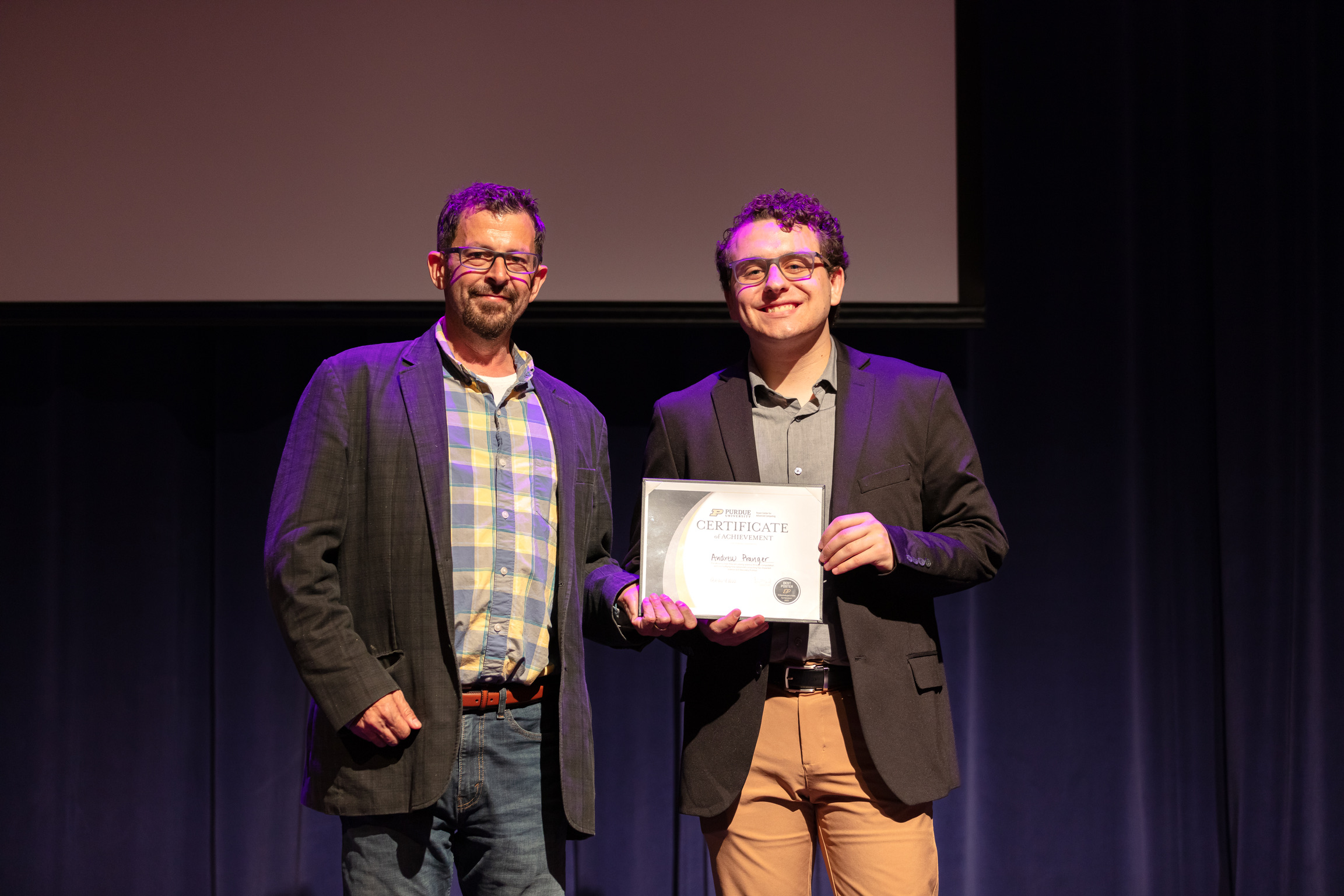 Preston Smith handing out student poster award